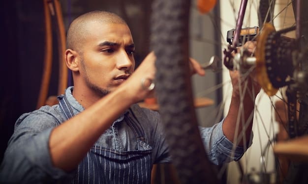 MRZ - Servicios - small business man mechanic bicycle wheel fixing repairs maintenance workshop male person employee serious handyman garage service inspection safety as technician 590464 503685